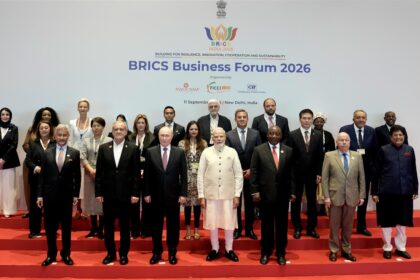 PM in a group photograph with BRICS leaders during the BRICS Business Forum 2026 on the sidelines of the 18th BRICS Summit at Bharat Mandapam, in New Delhi.