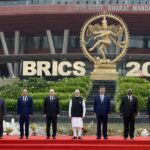 PM in a group photograph with BRICS leaders on the sidelines of the 18th BRICS Summit at Bharat Mandapam, in New Delhi.